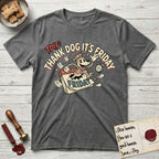 Thank Dog It's Friday T-Shirt flat lay in Dark Heather, featuring a retro 1930s cartoon of a Dog bursting through a Friday calendar page, surrounded by musical notes, stars, and a clock, with retro display lettering reading TDIF.