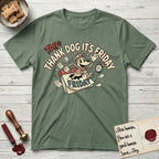 Thank Dog It's Friday T-Shirt flat lay in Military Green, featuring a retro 1930s cartoon of a Dog bursting through a Friday calendar page, surrounded by musical notes, stars, and a clock, with retro display lettering reading TDIF.