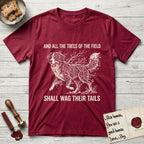 Trees of the Field Bernese Mountain Dog T-Shirt flat lay in Antique Cherry Red, featuring a vintage woodcut illustration of a Bernese Mountain Dog formed of bare windswept winter branches, mid-stride, with the words And All the Trees of the Field Shall Wag Their Tails.