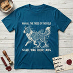 Trees of the Field Border Collie T-Shirt flat lay in Antique Sapphire, featuring a vintage woodcut illustration of a Border Collie formed of quaking aspen branches, mid-stride, with the words And All the Trees of the Field Shall Wag Their Tails.
