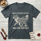 Trees of the Field Border Collie T-Shirt flat lay in Dark Heather Grey, featuring a vintage woodcut illustration of a Border Collie formed of quaking aspen branches, mid-stride, with the words And All the Trees of the Field Shall Wag Their Tails.