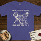 Trees of the Field Border Collie T-Shirt flat lay in Grape, featuring a vintage woodcut illustration of a Border Collie formed of quaking aspen branches, mid-stride, with the words And All the Trees of the Field Shall Wag Their Tails.