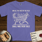 Trees of the Field German Shepherd T-Shirt flat lay in Violet, featuring a vintage woodcut illustration of a German Shepherd formed of oak branches with acorns, mid-stride, with the words And All the Trees of the Field Shall Wag Their Tails.