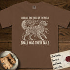 Trees of the Field Golden Retriever T-Shirt flat lay in Espresso, featuring a vintage woodcut illustration of a Golden Retriever formed of flowing willow branches, mid-stride, with the words And All the Trees of the Field Shall Wag Their Tails.