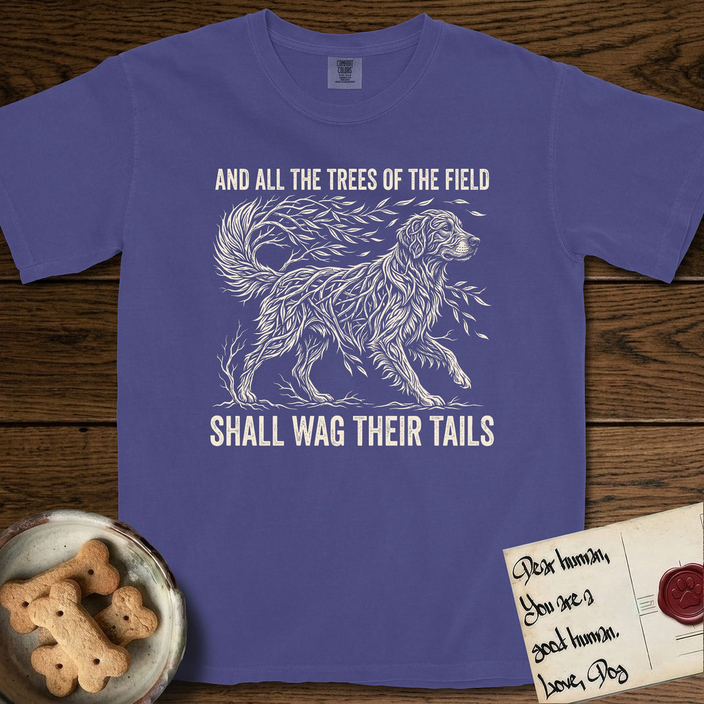 Trees of the Field Golden Retriever T-Shirt flat lay in Grape, featuring a vintage woodcut illustration of a Golden Retriever formed of flowing willow branches, mid-stride, with the words And All the Trees of the Field Shall Wag Their Tails.