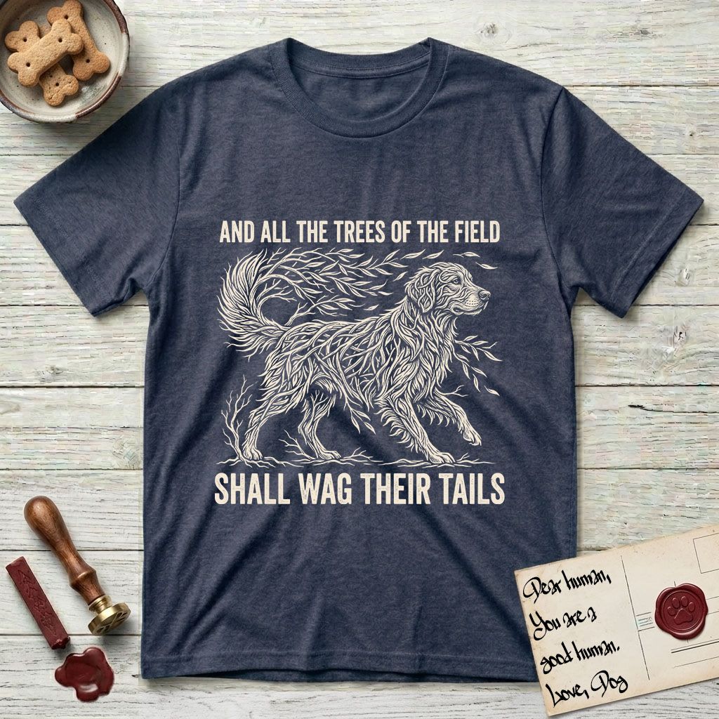 Trees of the Field Golden Retriever T-Shirt flat lay in Heather Navy, featuring a vintage woodcut illustration of a Golden Retriever formed of flowing willow branches, mid-stride, with the words And All the Trees of the Field Shall Wag Their Tails.