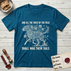 Trees of the Field Great Dane T-Shirt flat lay in Antique Sapphire, featuring a vintage woodcut illustration of a Great Dane formed of horse chestnut branches and leaves, mid-stride, with the words And All the Trees of the Field Shall Wag Their Tails.