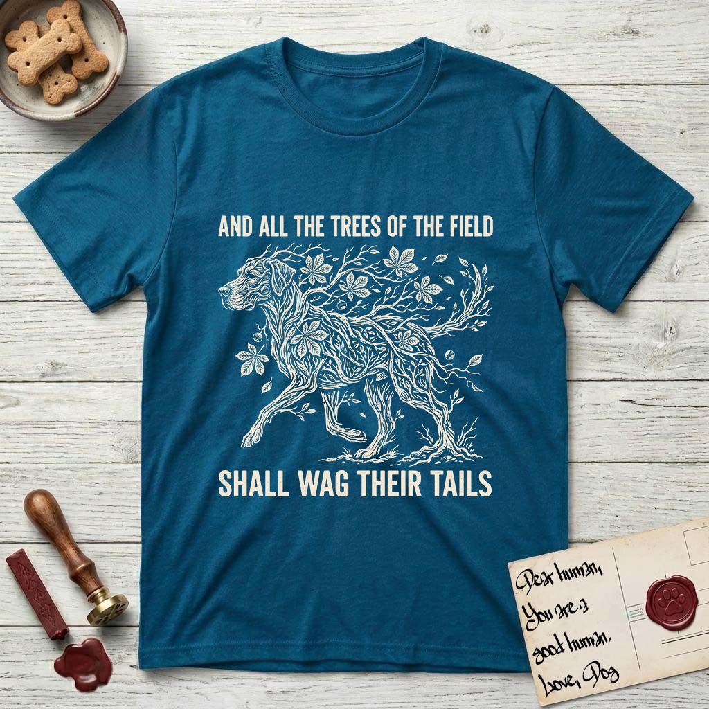 Trees of the Field Great Dane T-Shirt flat lay in Antique Sapphire, featuring a vintage woodcut illustration of a Great Dane formed of horse chestnut branches and leaves, mid-stride, with the words And All the Trees of the Field Shall Wag Their Tails.
