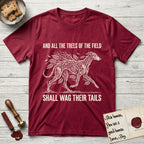 Trees of the Field Greyhound T-Shirt flat lay in Antique Cherry Red, featuring a vintage woodcut illustration of a Greyhound formed of ash branches with streaming leaves, mid-stride, with the words And All the Trees of the Field Shall Wag Their Tails.