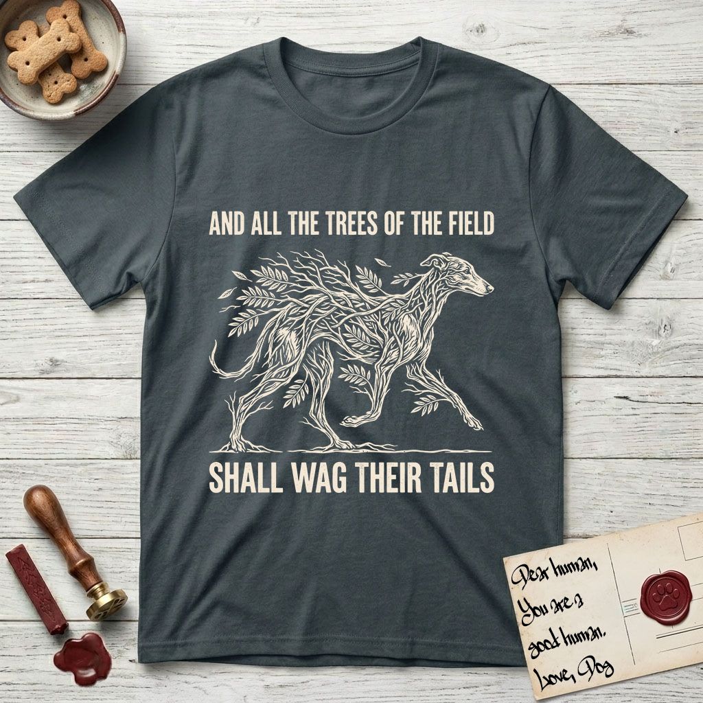 Trees of the Field Greyhound T-Shirt flat lay in Dark Heather Grey, featuring a vintage woodcut illustration of a Greyhound formed of ash branches with streaming leaves, mid-stride, with the words And All the Trees of the Field Shall Wag Their Tails.