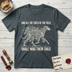 Trees of the Field Greyhound T-Shirt flat lay in Dark Heather Grey, featuring a vintage woodcut illustration of a Greyhound formed of ash branches with streaming leaves, mid-stride, with the words And All the Trees of the Field Shall Wag Their Tails.