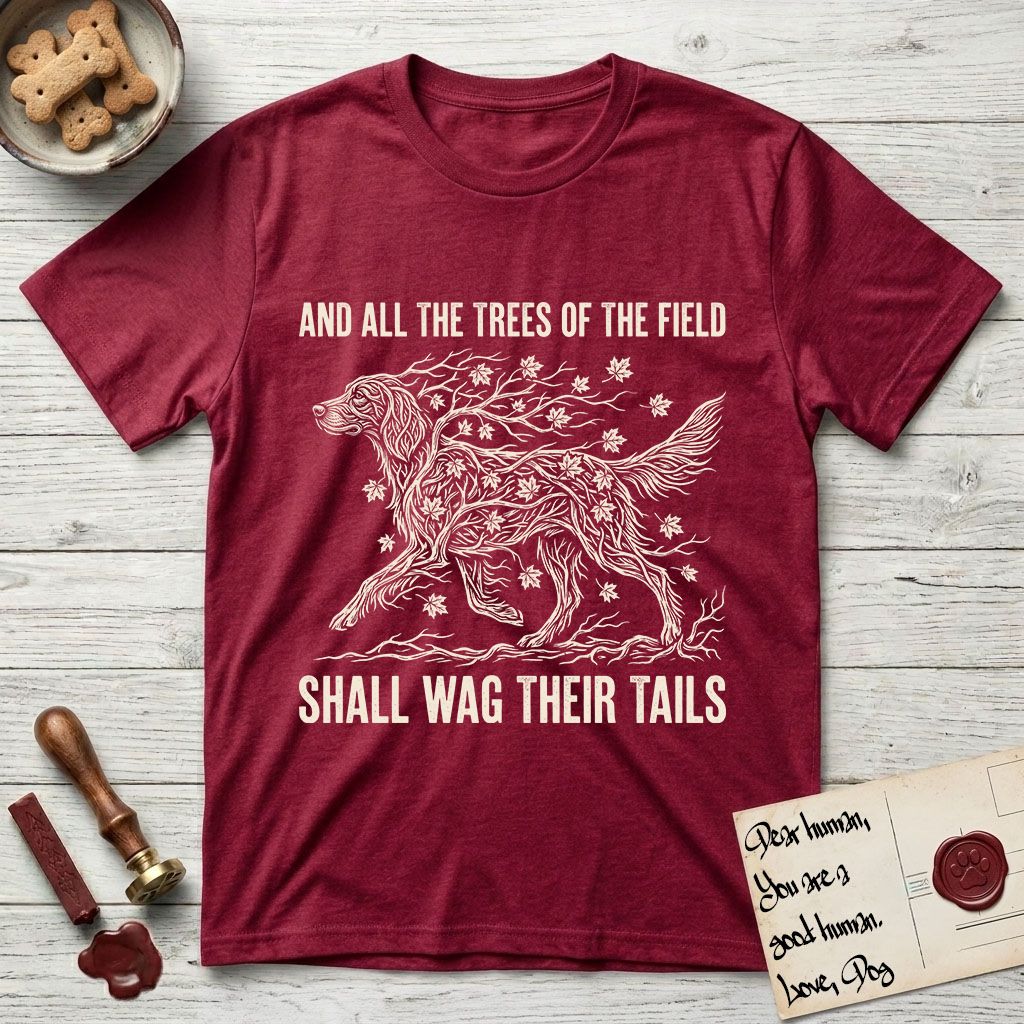 Trees of the Field Irish Setter T-Shirt flat lay in Antique Cherry Red, featuring a vintage woodcut illustration of an Irish Setter formed of red maple branches with autumn leaves, mid-stride, with the words And All the Trees of the Field Shall Wag Their Tails.