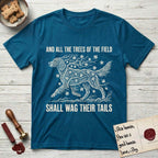 Trees of the Field Irish Setter T-Shirt flat lay in Antique Sapphire, featuring a vintage woodcut illustration of an Irish Setter formed of red maple branches with autumn leaves, mid-stride, with the words And All the Trees of the Field Shall Wag Their Tails.