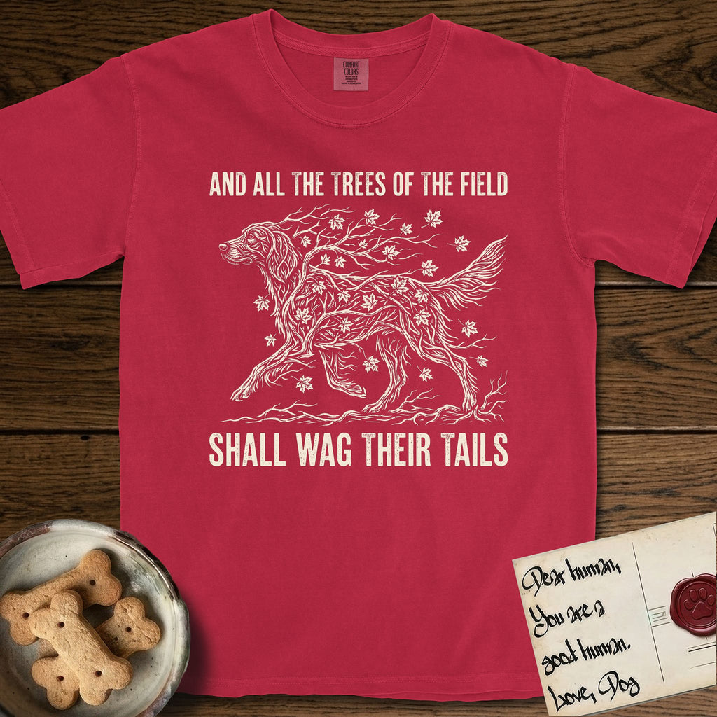 Trees of the Field Irish Setter T-Shirt flat lay in Red, featuring a vintage woodcut illustration of an Irish Setter formed of red maple branches with autumn leaves, mid-stride, with the words And All the Trees of the Field Shall Wag Their Tails.