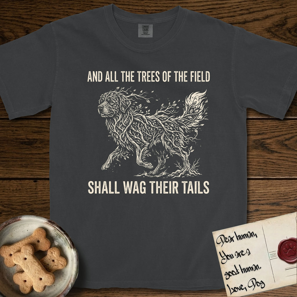 Trees of the Field Newfoundland T-Shirt flat lay in Graphite, featuring a vintage woodcut illustration of a Newfoundland formed of linden branches in full leaf, mid-stride, with the words And All the Trees of the Field Shall Wag Their Tails.