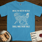 Trees of the Field Newfoundland T-Shirt flat lay in Royal Caribe, featuring a vintage woodcut illustration of a Newfoundland formed of linden branches in full leaf, mid-stride, with the words And All the Trees of the Field Shall Wag Their Tails.