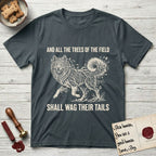 Trees of the Field Samoyed T-Shirt flat lay in Dark Heather Grey, featuring a vintage woodcut illustration of a Samoyed formed of white birch branches with catkins, mid-stride, with the words And All the Trees of the Field Shall Wag Their Tails.