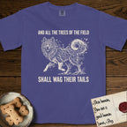 Trees of the Field Samoyed T-Shirt flat lay in Grape, featuring a vintage woodcut illustration of a Samoyed formed of white birch branches with catkins, mid-stride, with the words And All the Trees of the Field Shall Wag Their Tails.