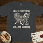 Trees of the Field Samoyed T-Shirt flat lay in Graphite, featuring a vintage woodcut illustration of a Samoyed formed of white birch branches with catkins, mid-stride, with the words And All the Trees of the Field Shall Wag Their Tails.