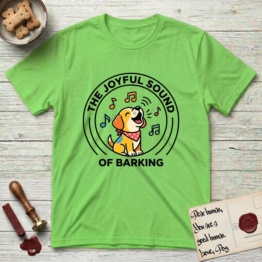 The Joyful Sound of Barking T-Shirt flat lay in Lime, featuring a flat vector cartoon emblem of a happy puppy with lifted ears surrounded by musical notes, ringed by the words The Joyful Sound of Barking.