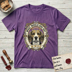 What Would Dog Do Beagle T-Shirt flat lay in Heather Purple, featuring a baroque scrollwork gold portrait medallion of a haloed Beagle with the question What Would Dog Do.