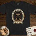 What Would Dog Do Belgian Malinois T-Shirt flat lay in Black, featuring a vintage gold portrait medallion of a haloed Belgian Malinois in an ornamental rosette-scroll border with the question What Would Dog Do.