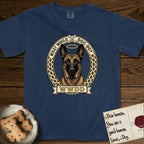 What Would Dog Do Belgian Malinois T-Shirt flat lay in True Navy, featuring a vintage gold portrait medallion of a haloed Belgian Malinois in an ornamental rosette-scroll border with the question What Would Dog Do.