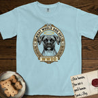What Would Dog Do Boxer T-Shirt flat lay in Chambray, featuring a Greek-key bordered gold portrait medallion of a haloed Boxer with natural uncropped ears and the question What Would Dog Do.
