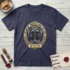 What Would Dog Do Boxer T-Shirt flat lay in Navy, featuring a Greek-key bordered gold portrait medallion of a haloed Boxer with natural uncropped ears and the question What Would Dog Do.