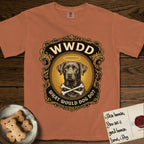 What Would Dog Do Chocolate Lab T-Shirt flat lay in Yam, featuring a baroque gold ornate portrait medallion of a haloed Chocolate Lab with the question What Would Dog Do.