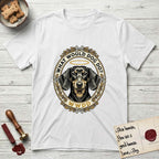What Would Dog Do Dachshund T-Shirt flat lay in White, featuring an oak-leaf and acorn framed gold portrait medallion of a haloed Dachshund with the question What Would Dog Do.