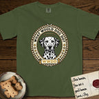 What Would Dog Do Dalmatian T-Shirt flat lay in Hemp, featuring a vintage gold portrait medallion of a haloed Dalmatian in an engraved coin-style dotted border with the question What Would Dog Do.