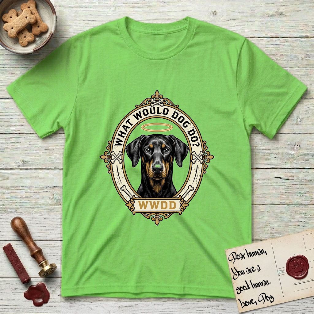 What Would Dog Do Doberman T-Shirt flat lay in Lime, featuring a fleur-de-lis framed gold portrait medallion of a haloed Doberman with natural uncropped ears and the question What Would Dog Do.