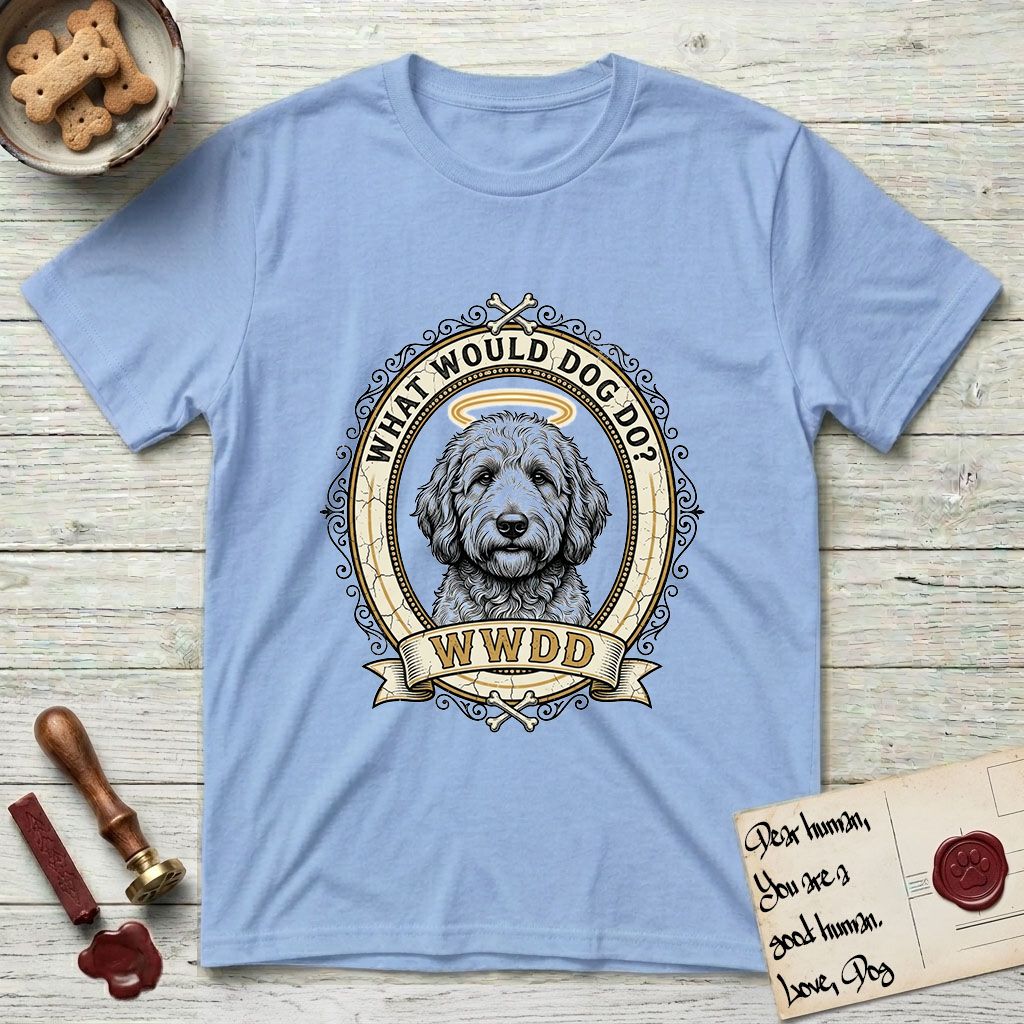 What Would Dog Do Goldendoodle T-Shirt flat lay in Light Blue, featuring an ornate scrollwork gold portrait medallion of a haloed Goldendoodle with the question What Would Dog Do.