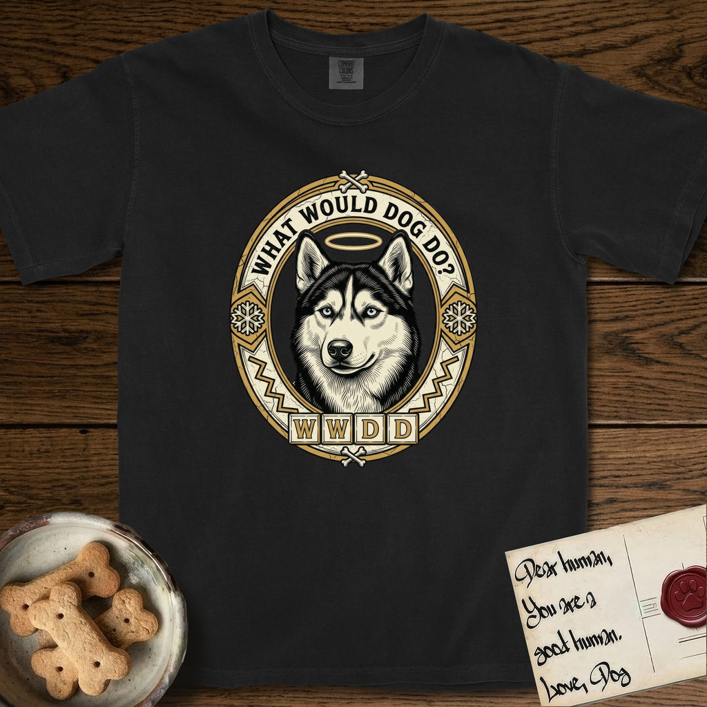 What Would Dog Do Husky T-Shirt flat lay in Black, featuring a vintage gold portrait medallion of a haloed blue-eyed Husky in a Nordic snowflake border with the question What Would Dog Do.