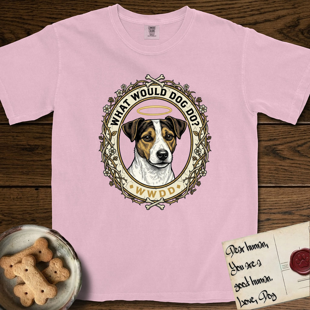 What Would Dog Do Jack Russell T-Shirt flat lay in Blossom, featuring a vintage gold portrait medallion of a haloed Jack Russell in a wreath of thorned branches and wildflowers with the question What Would Dog Do.