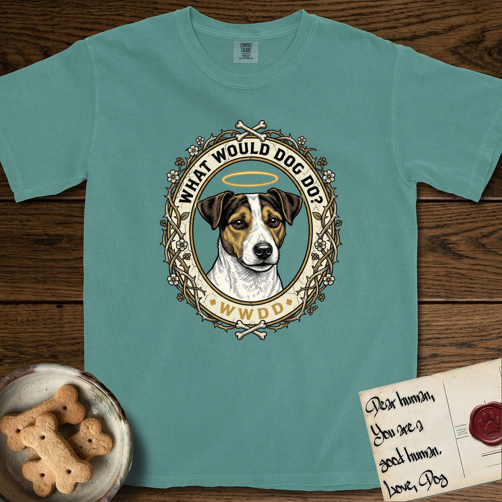 What Would Dog Do Jack Russell T-Shirt flat lay in Blue Spruce, featuring a vintage gold portrait medallion of a haloed Jack Russell in a wreath of thorned branches and wildflowers with the question What Would Dog Do.