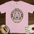 What Would Dog Do Samoyed T-Shirt flat lay in Blossom, featuring a rope-twist framed gold portrait medallion of a haloed Samoyed with the question What Would Dog Do.