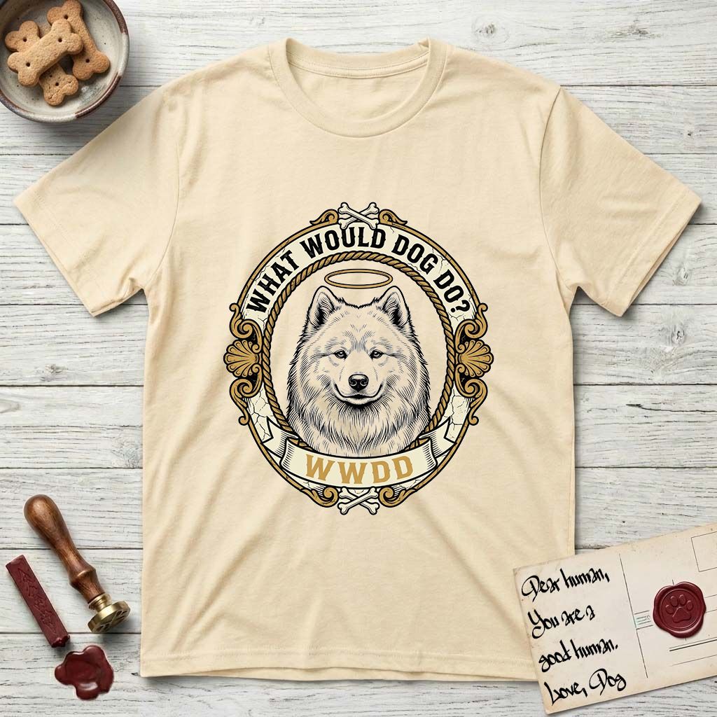 What Would Dog Do Samoyed T-Shirt flat lay in Natural, featuring a rope-twist framed gold portrait medallion of a haloed Samoyed with the question What Would Dog Do.