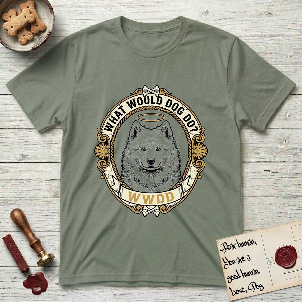 What Would Dog Do Samoyed T-Shirt flat lay in Sage, featuring a rope-twist framed gold portrait medallion of a haloed Samoyed with the question What Would Dog Do.