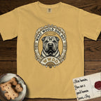 What Would Dog Do Shar-Pei T-Shirt flat lay in Mustard, featuring a vintage gold portrait medallion of a haloed wrinkled Shar-Pei in an ornate scrolled frame with a folding fan banner and the question What Would Dog Do.