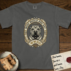 What Would Dog Do Shar-Pei T-Shirt flat lay in Pepper, featuring a vintage gold portrait medallion of a haloed wrinkled Shar-Pei in an ornate scrolled frame with a folding fan banner and the question What Would Dog Do.