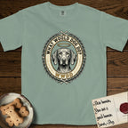 What Would Dog Do Vizsla T-Shirt flat lay in Bay, featuring a laurel-wreath framed gold portrait medallion of a haloed Vizsla with the question What Would Dog Do.