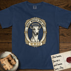 What Would Dog Do Whippet T-Shirt flat lay in True Navy, featuring a vintage gold portrait medallion of a haloed Whippet in an Art Deco stepped frame with the question What Would Dog Do.